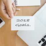 New Year 2018 – Closeup top view photo woman showing 2018 goal l